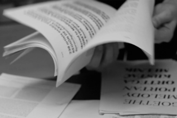 black white image reading documents